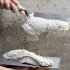 TECNOCEM HIDRO BLANCO da Tecno Prodist - Argamassa de cimento de espessura grossa, impermeável e hidrófuga, para rebocos e estuques.